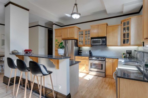 1-804 18 Avenue Sw, Calgary, AB - Indoor Photo Showing Kitchen With Stainless Steel Kitchen With Double Sink