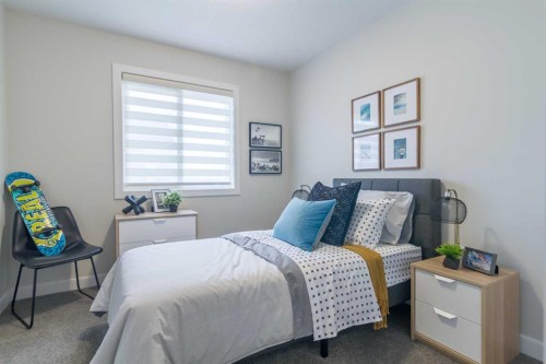 1157 Iron Ridge Avenue, Crossfield, AB - Indoor Photo Showing Bedroom