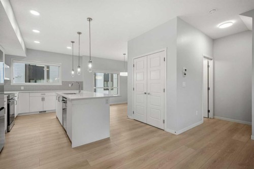 408-20295 Seton Way Se, Calgary, AB - Indoor Photo Showing Kitchen With Upgraded Kitchen