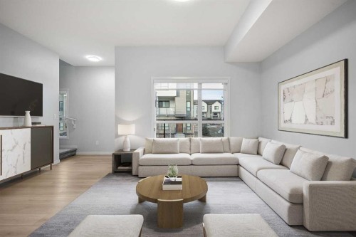 408-20295 Seton Way Se, Calgary, AB - Indoor Photo Showing Living Room