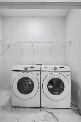 408-20295 Seton Way Se, Calgary, AB - Indoor Photo Showing Laundry Room