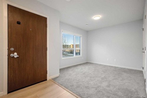 408-20295 Seton Way Se, Calgary, AB - Indoor Photo Showing Other Room