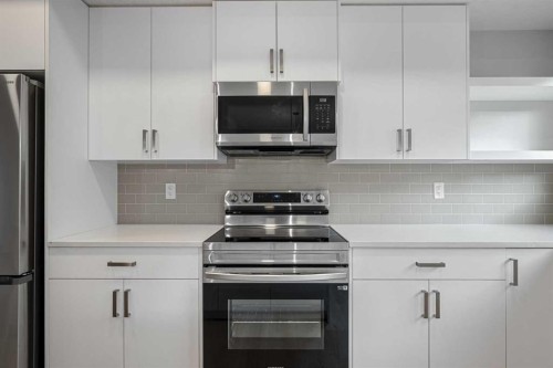 408-20295 Seton Way Se, Calgary, AB - Indoor Photo Showing Kitchen With Upgraded Kitchen