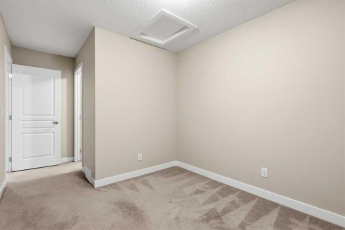 71 Panatella Hill Nw, Calgary, AB - Indoor Photo Showing Other Room