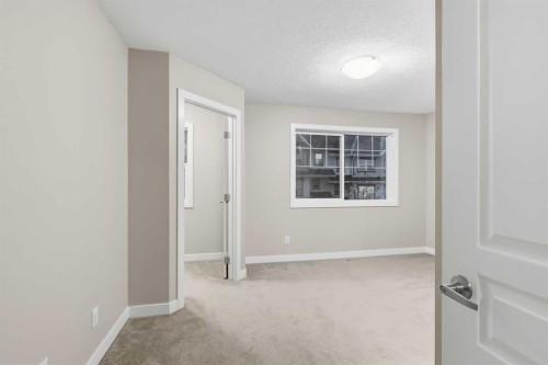 71 Panatella Hill Nw, Calgary, AB - Indoor Photo Showing Other Room
