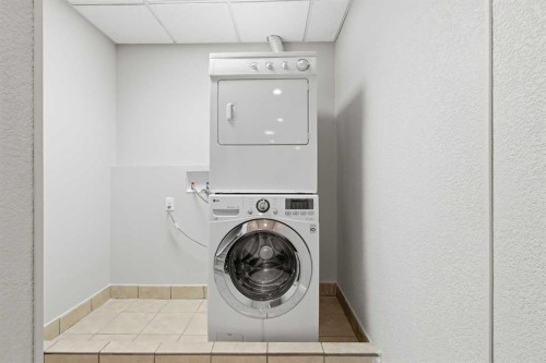 71 Panatella Hill Nw, Calgary, AB - Indoor Photo Showing Laundry Room