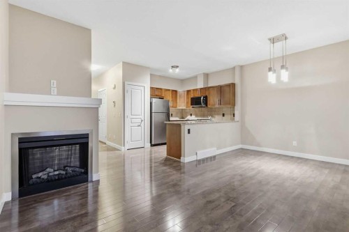 71 Panatella Hill Nw, Calgary, AB - Indoor With Fireplace