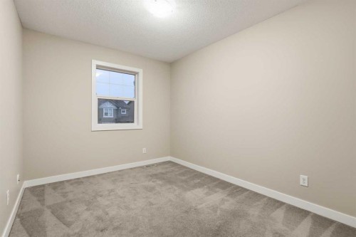 71 Panatella Hill Nw, Calgary, AB - Indoor Photo Showing Other Room