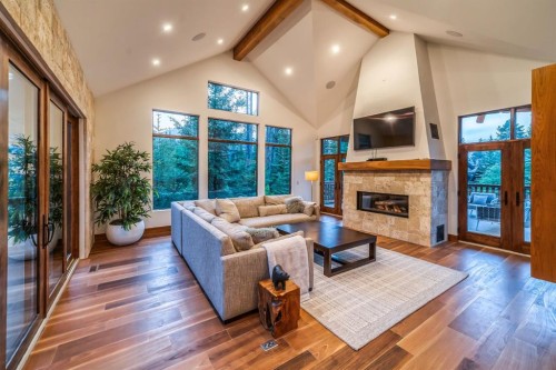 118 Cairns Landing, Canmore, AB - Indoor Photo Showing Living Room With Fireplace