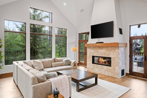 118 Cairns Landing, Canmore, AB - Indoor Photo Showing Living Room With Fireplace