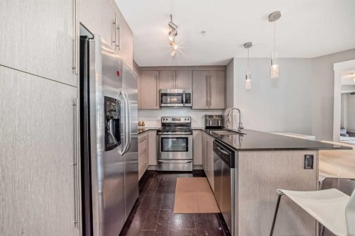 1113-11 Mahogany Row Se, Calgary, AB - Indoor Photo Showing Kitchen With Stainless Steel Kitchen With Upgraded Kitchen
