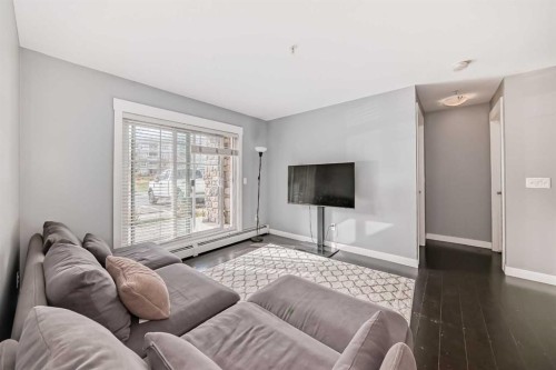 1113-11 Mahogany Row Se, Calgary, AB - Indoor Photo Showing Living Room