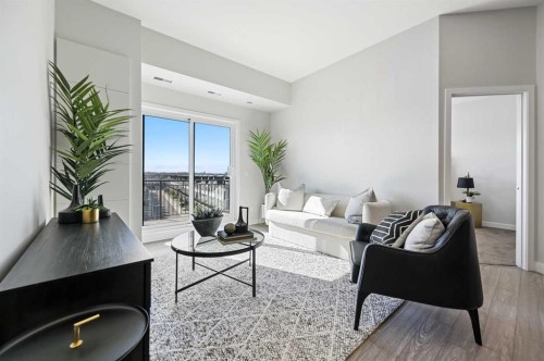 422-255 Les Jardins Park Se, Calgary, AB - Indoor Photo Showing Living Room