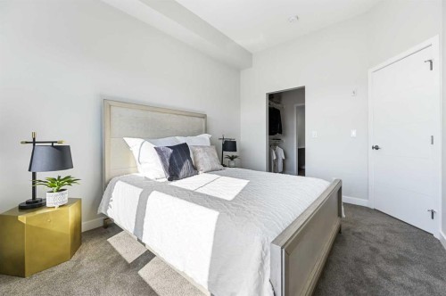 422-255 Les Jardins Park Se, Calgary, AB - Indoor Photo Showing Bedroom
