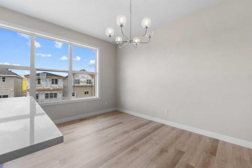 121 Wild Rose Way Se, Calgary, AB - Indoor Photo Showing Other Room