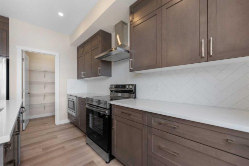 121 Wild Rose Way Se, Calgary, AB - Indoor Photo Showing Kitchen