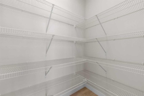 121 Wild Rose Way Se, Calgary, AB - Indoor With Storage