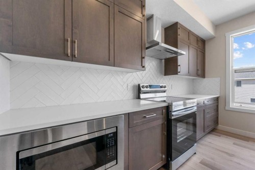 121 Wild Rose Way Se, Calgary, AB - Indoor Photo Showing Kitchen