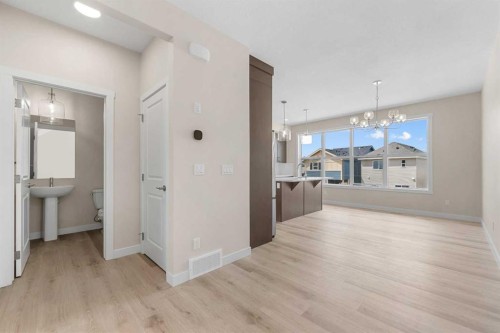 121 Wild Rose Way Se, Calgary, AB - Indoor Photo Showing Other Room