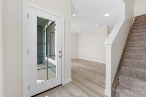 121 Wild Rose Way Se, Calgary, AB - Indoor Photo Showing Other Room