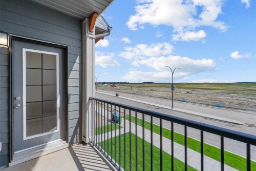 121 Wild Rose Way Se, Calgary, AB - Outdoor With Balcony With View