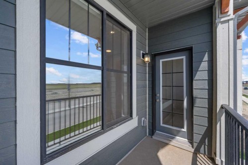 121 Wild Rose Way Se, Calgary, AB - Outdoor With Balcony With Exterior