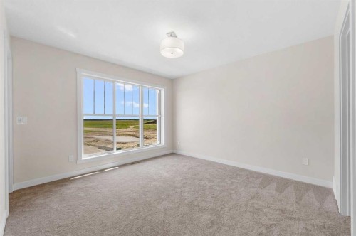 121 Wild Rose Way Se, Calgary, AB - Indoor Photo Showing Other Room