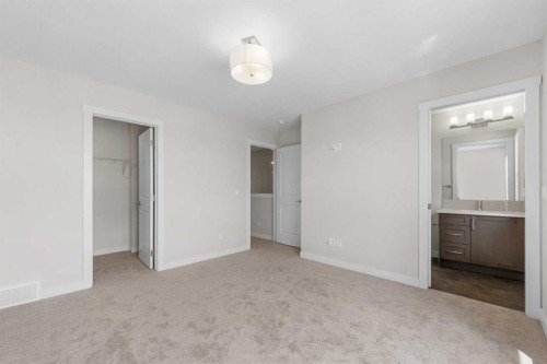 121 Wild Rose Way Se, Calgary, AB - Indoor Photo Showing Other Room
