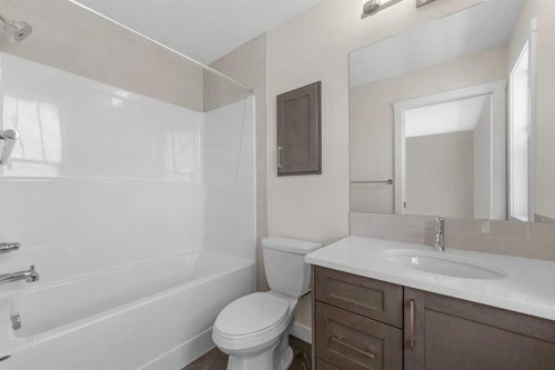 121 Wild Rose Way Se, Calgary, AB - Indoor Photo Showing Bathroom