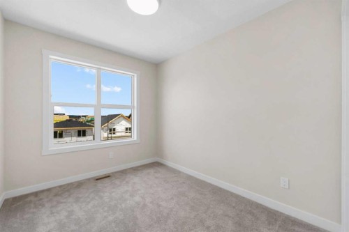 121 Wild Rose Way Se, Calgary, AB - Indoor Photo Showing Other Room