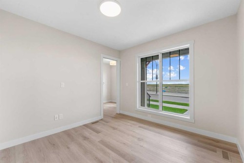 121 Wild Rose Way Se, Calgary, AB - Indoor Photo Showing Other Room