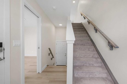121 Wild Rose Way Se, Calgary, AB - Indoor Photo Showing Other Room