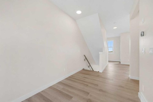121 Wild Rose Way Se, Calgary, AB - Indoor Photo Showing Other Room