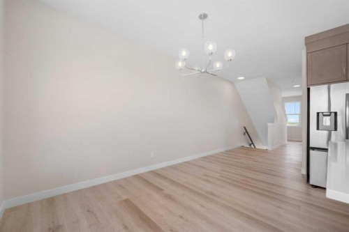 121 Wild Rose Way Se, Calgary, AB - Indoor Photo Showing Other Room