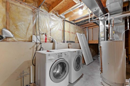 7136 Laguna Way Ne, Calgary, AB - Indoor Photo Showing Laundry Room