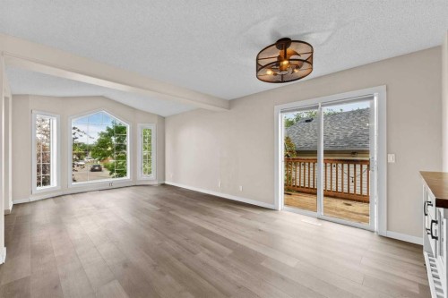 7136 Laguna Way Ne, Calgary, AB - Indoor Photo Showing Living Room