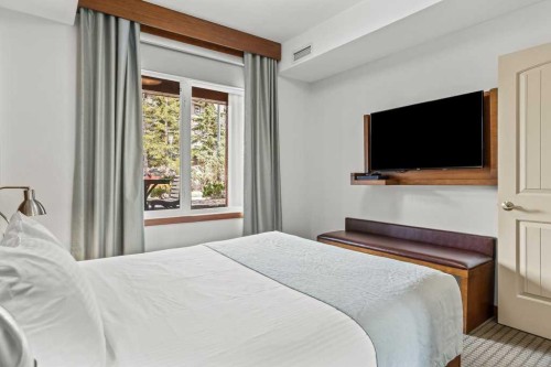 109-190 Kananaskis Way, Canmore, AB - Indoor Photo Showing Bedroom