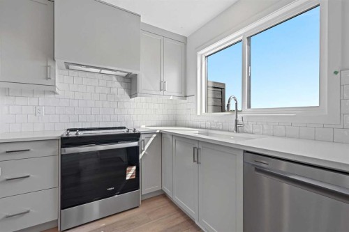 922 Wolf Willow Boulevard Se, Calgary, AB - Indoor Photo Showing Kitchen With Stainless Steel Kitchen With Upgraded Kitchen
