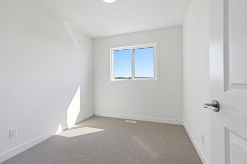922 Wolf Willow Boulevard Se, Calgary, AB - Indoor Photo Showing Other Room