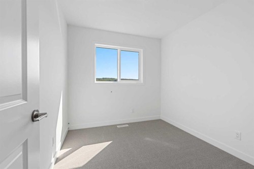 922 Wolf Willow Boulevard Se, Calgary, AB - Indoor Photo Showing Other Room