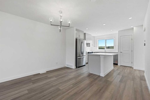 922 Wolf Willow Boulevard Se, Calgary, AB - Indoor Photo Showing Kitchen With Stainless Steel Kitchen