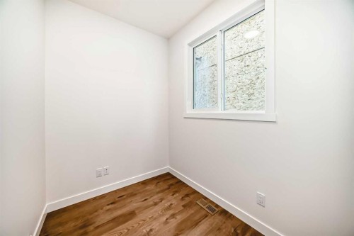 426 Heartland Way, Cochrane, AB - Indoor Photo Showing Other Room