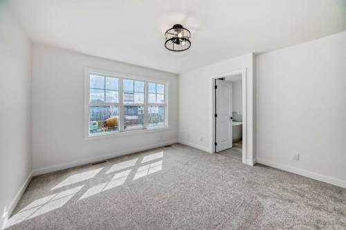 426 Heartland Way, Cochrane, AB - Indoor Photo Showing Other Room