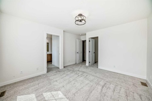 426 Heartland Way, Cochrane, AB - Indoor Photo Showing Other Room