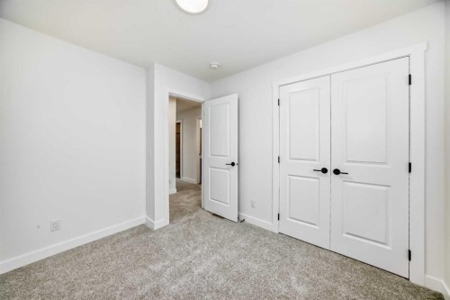 426 Heartland Way, Cochrane, AB - Indoor Photo Showing Other Room