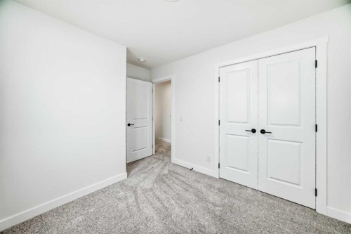 426 Heartland Way, Cochrane, AB - Indoor Photo Showing Other Room