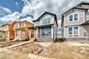 426 Heartland Way, Cochrane, AB  - Outdoor With Facade 
