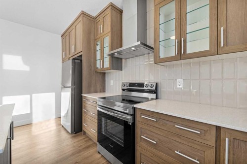 1059 Southwinds Green Sw, Airdrie, AB - Indoor Photo Showing Kitchen With Stainless Steel Kitchen