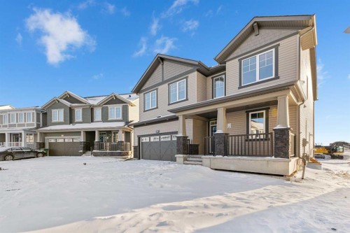 1059 Southwinds Green Sw, Airdrie, AB - Outdoor With Deck Patio Veranda With Facade