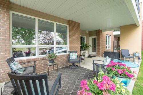 2110-10221 Tuscany Boulevard Nw, Calgary, AB - Outdoor With Deck Patio Veranda With Exterior
